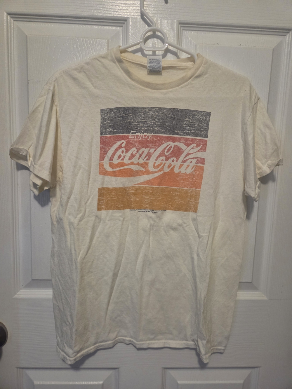 Coca Cola Cream Short Sleeve Graphic Tee with Navy Red Orange Stripe Logo